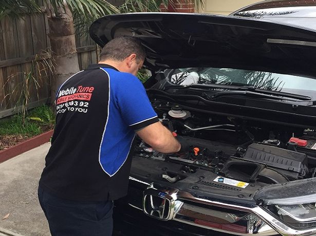 Expert car mechanic in action